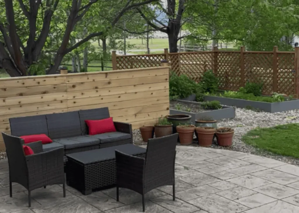 Wooden backyard privacy screens installed by Seasons Home Solutions