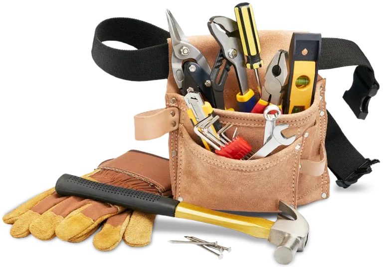 A tool belt with tools in the pouches and gloves, a hammer and nails sitting next to it